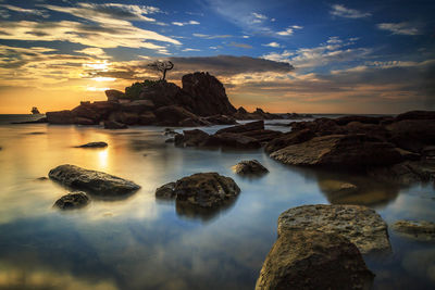 Scenic view of sea against sky during sunset