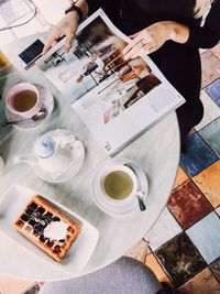 High angle view of coffee cup on table