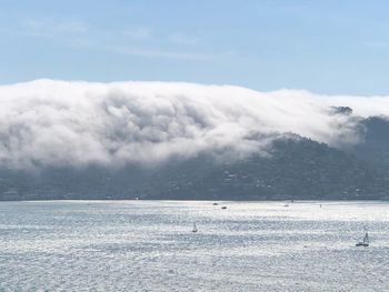 Scenic view of sea against sky during winter
