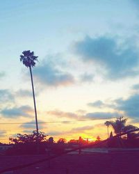 Scenic view of landscape against sky at sunset