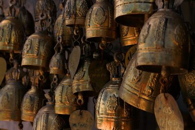 Full frame shot of bells on a wall