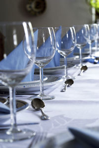 Row of wineglasses on table at restaurant