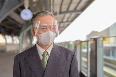 Portrait of man wearing mask