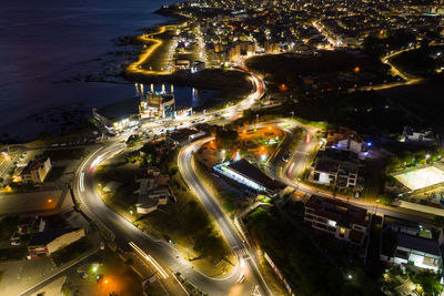 High angle view of illuminated city at night