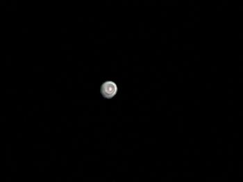 Low angle view of moon against sky at night