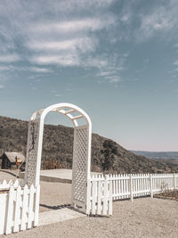 Built structure on shore against sky