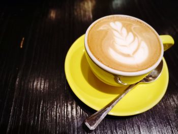 High angle view of cappuccino on table