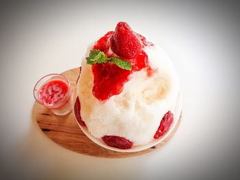 Close-up of strawberry over white background