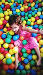 Portrait of happy girl playing