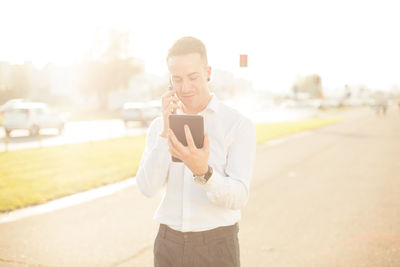 Young man using mobile phone