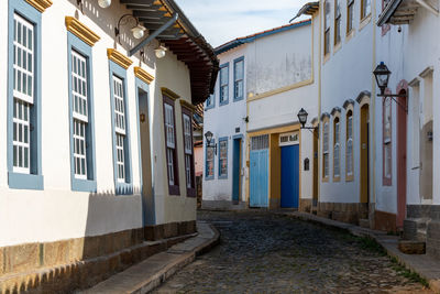 Alley amidst buildings in city