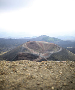Scenic view of arid landscape against sky