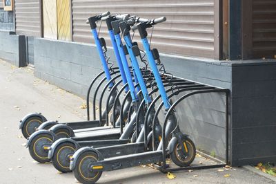 Bicycles parked on footpath in parking lot