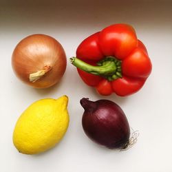 Close-up of fruits against white background