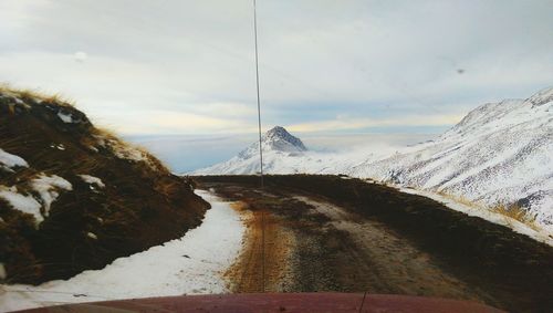 Scenic view of snow covered mountains