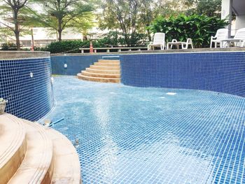 View of swimming pool against trees