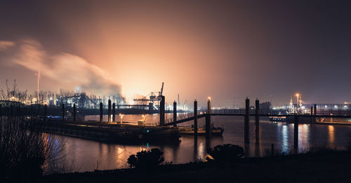 View of river in city at night