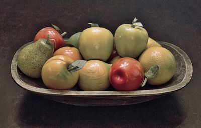 Close-up of fruits over white background