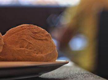 Close-up of bread in plate on table