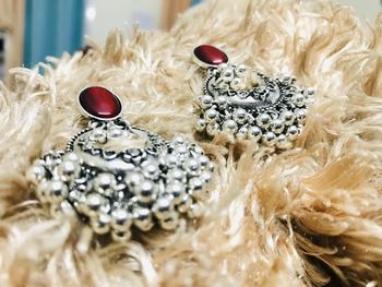 High angle view of wedding rings on table