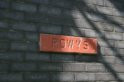 Information sign on brick wall