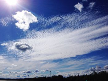 Sun shining through clouds