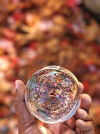 Close-up of hand holding crystal