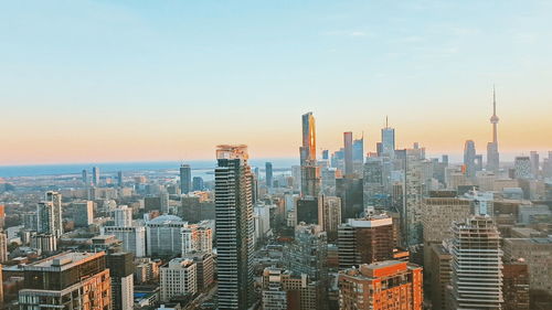 Cityscape against clear sky at morning