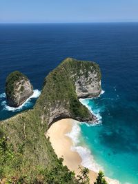 High angle view of sea shore against sky