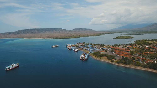 High angle view of boats in sea against sky