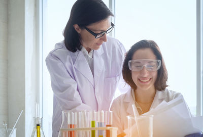 Scientists working together in laboratory
