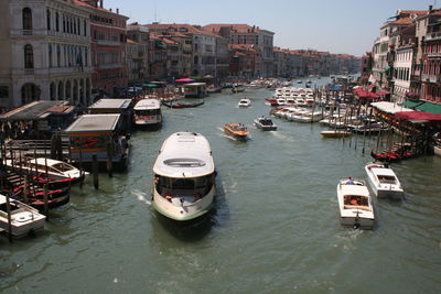 High angle view of boats moored at canal