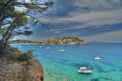 Scenic view of sea against blue sky