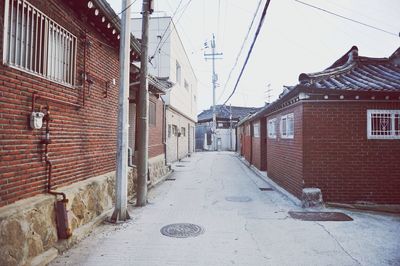 Narrow alley along houses