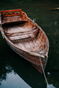 Fishing boat moored in lake