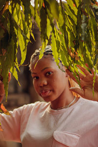 Portrait of smiling young woman outdoors