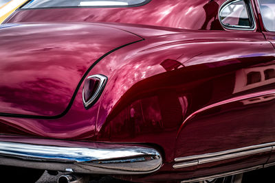 Purple vintage car parked