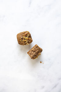 High angle view of cookies against white background