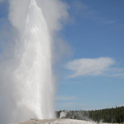 Low angle view of waterfall against sky