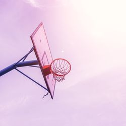 Low angle view of basketball hoop against sky