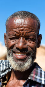 Close-up portrait of a man smiling