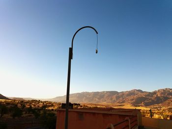 Street light against clear sky