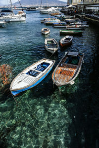 High angle view of boats moored on lake