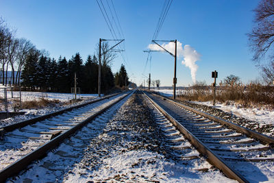 View of railroad tracks in winter