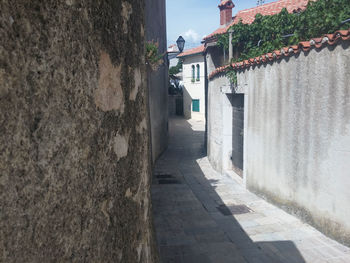 Narrow alley along buildings