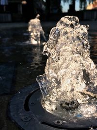 Close-up of ice on water