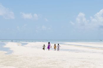 GROUP OF PEOPLE ON BEACH