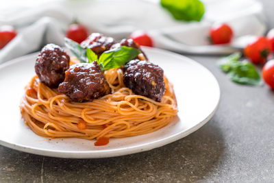 Close-up of pasta in plate on table