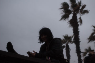 Low angle view of silhouette tree against clear sky