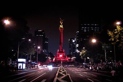 View of city lit up at night